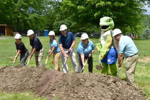 Left to right: Gina Vary, Project Architect, Spillman Farmer Architects; Ron Jerdon, President, Jerdon Construction; Amanda Shurr, President and CEO, LV Zoo; Dean Meiser, Project Manager, Jerdon Construction; Maggie Morse, Curator, LV Zoo; Matt Goense, Secretary, LV Zoo Board of Directors (Owner, Krings Stoves and Fireplaces); Radley the Sea Turtle, Mascot, LV Zoo