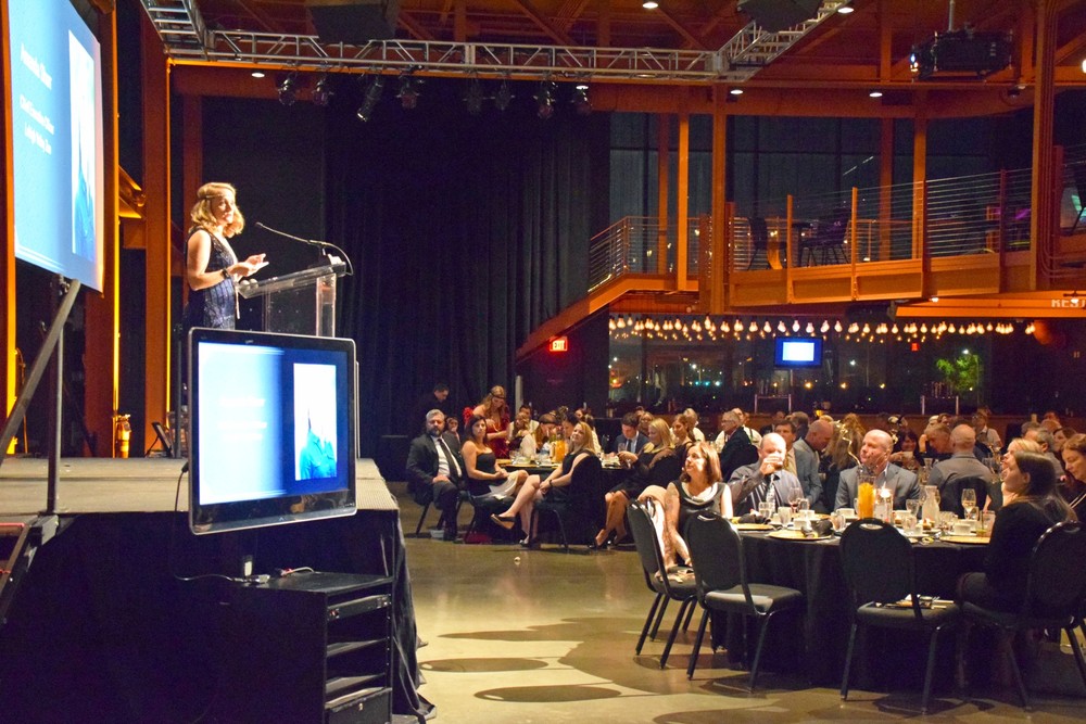 LV Zoo CEO Amanda Shurr speaking on stage at the Conservation Celebration