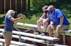 Educator Alana presenting our Woma Python during a Wonders of Wildlife presentation